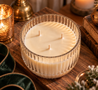 Elevated view showing three cotton wicks in Holiday Heirloom ribbed glass candle